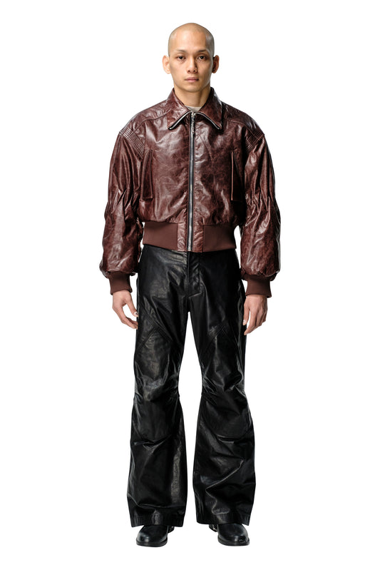 Leather Bomber With Restrained Arms