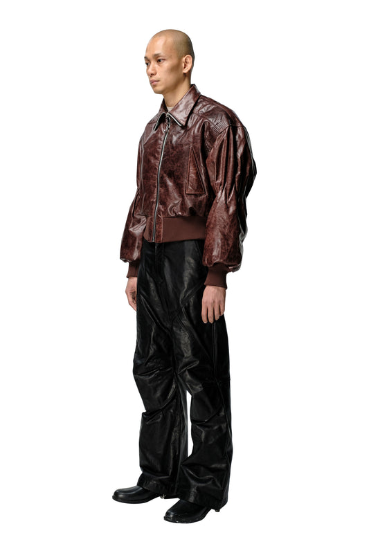 Leather Bomber With Restrained Arms